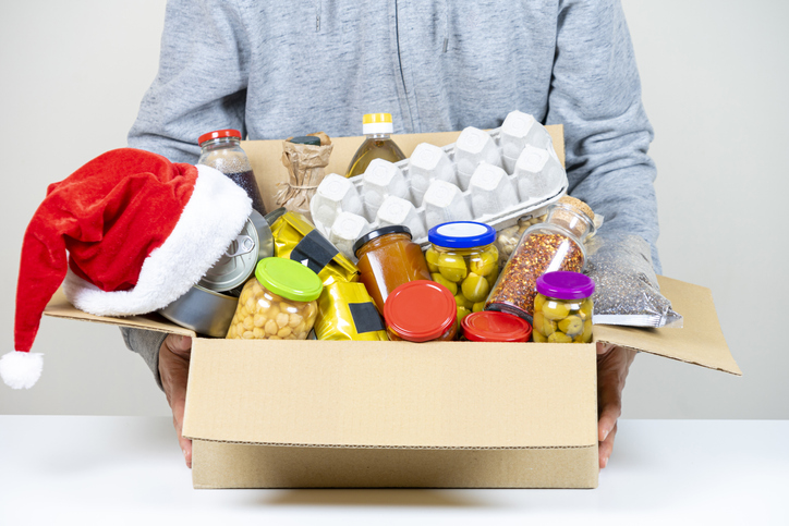 Box of food with a santa hat